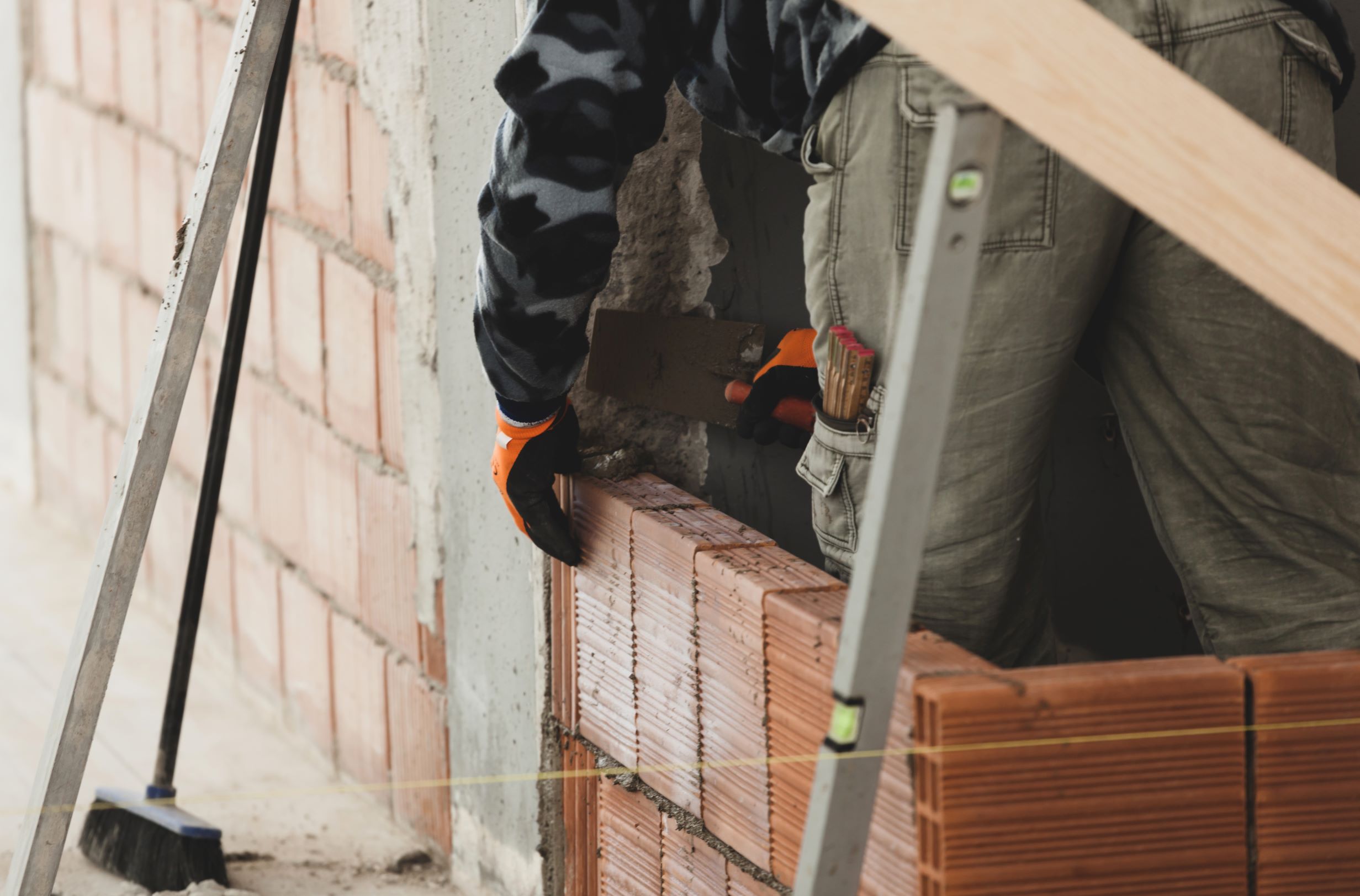 bricklayer working on new brick wall construction 2026 03 24 09 11 29 utc1