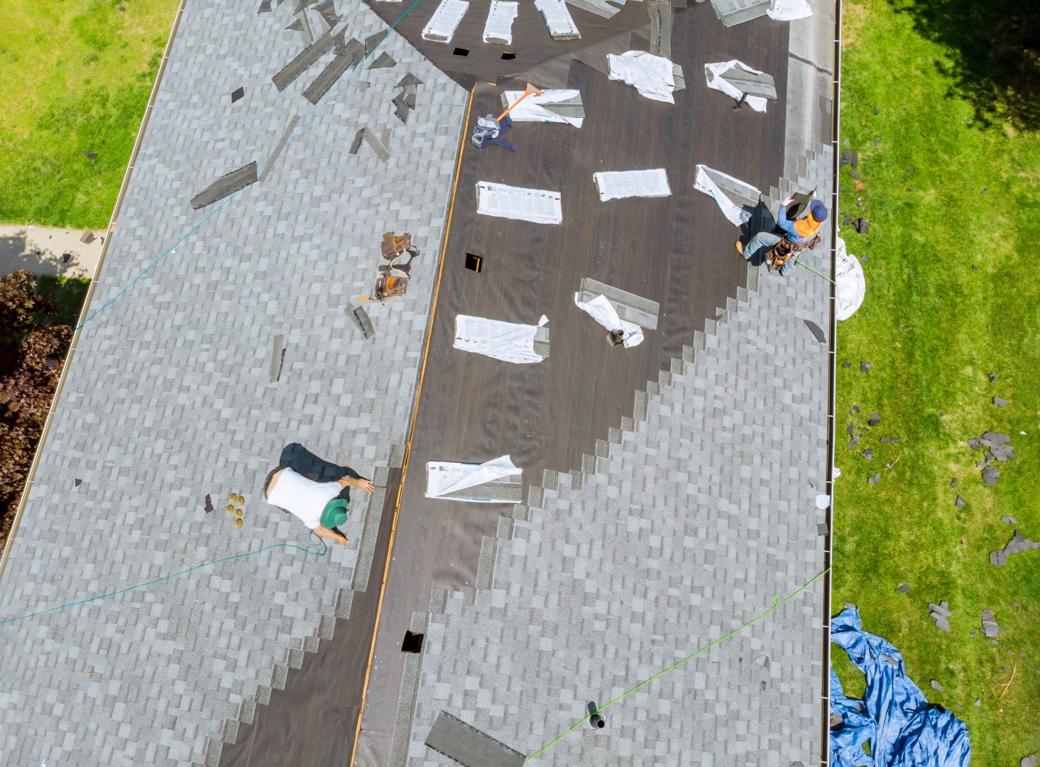 roofer working on replacement asphalt shingle roof 2026 03 09 02 55 42 utc Large 1